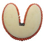 A Victorian coral bead necklace, of graduated form, from 7 - 3 mm, paste set silver clasp, length 34