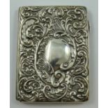 An Edwardian silver card case, Birmingham 1904, of rectangular form with all over embossed