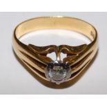 An 18ct gold single stone gentleman's diamond ring, illusion set with a brilliant cut stone weighing