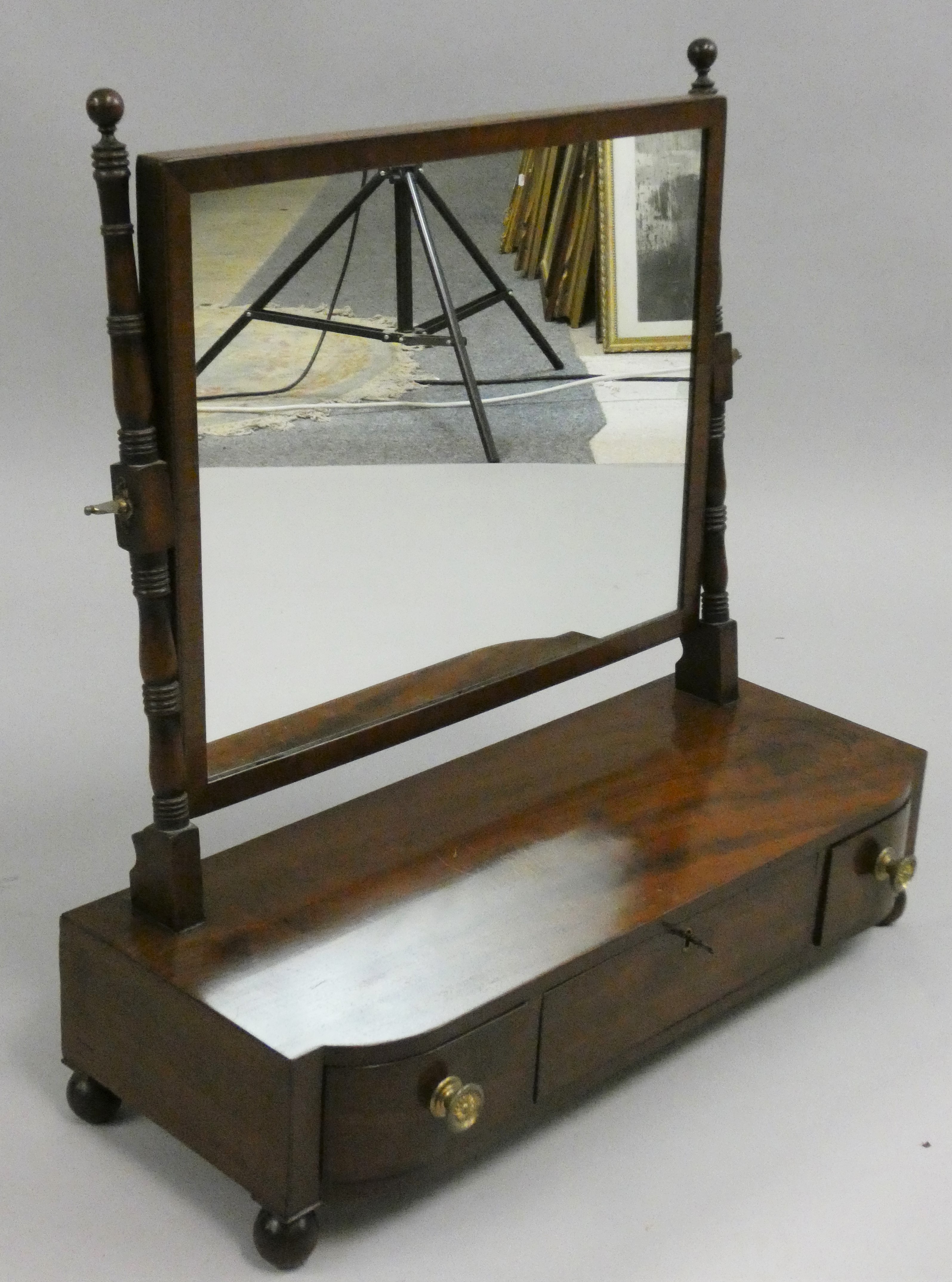 A Victorian mahogany dressing table swing mirror, the rectangular plate, 39 x 48 cm, mounted on a