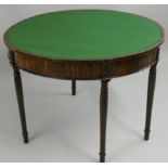 A 19th century mahogany fold over D shape table, with baize cover, palmettes to the frieze, tapering