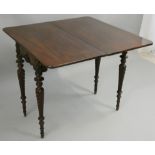 A Victorian mahogany fold over swivel occasional table, raised on four tapering turned legs, 90 x 45
