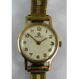 A 9ct gold ladies Omega manual wind wristwatch, London 1968, the silvered dial with Arabic numerals,