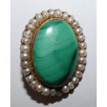 A Victorian gold, malachite and pearl brooch, collet set with a cabochon stone border by natural