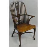A mahogany gentleman's Windsor type armchair, with floral splat, cabriole front legs, 57 cm wide.