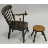 A 19th century fruitwood child's chair with spindle band, screw pegs to the arms, lacking