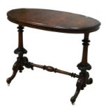 A Victorian burr walnut oval occasional table, with boxwood inlay, to carved legs with a