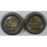 A pair of Victorian wood and copper alloy wall plaques, one depicting religious scene of Adam and