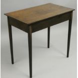 An oak side table, with single frieze drawer to tapering legs, 77 x 46 x 72 cm.