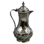 A George III silver lidded hot water pot, by Thomas Whipham & Charles Wright, London 1763, of