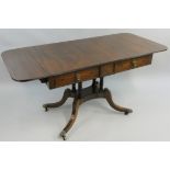 A 19th century mahogany and ebony strung sofa table, with two unequal length frieze drawers,