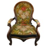 A Victorian mahogany upholstered armchair, with scroll arms and cabriole front legs, tapestry