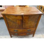 Early twentieth century bow fronted mahogany cabinet 69cm long 73cm tall.