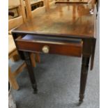 A 19th century mahogany Pembroke table, with turned legs and single end drawer and dummy drawer.