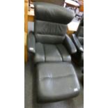 A matching Stressless Consul swivel recliner with footstool.