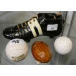 An Italian made Garnier Liqueurs ceramic decanter in the form of a football boot, No. 345,