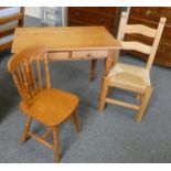 A pine twin drawer table together with pine chair and rush seated single chair (3)