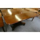 A mahogany drop leaf dining table 112cmx110cm extended.