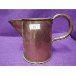 A copper jug imprinted with date and initials G T Hardee 1901