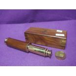 A nautical style telescope with brass and wood fitments with case