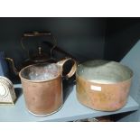 A selection of copper kitchen wares including stove kettle, large pan and grain scoop