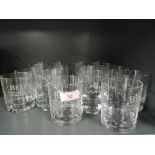 A selection of Whiskey and similar glass tumblers with etched Bells logo