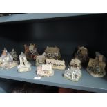 A selection of model houses by Lilliput Lane including Bridge House Ambleside