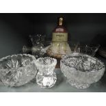 A selection of clear cut crystal glass wares and glass galleon ship in bottle