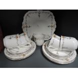 A part tea service by Shelley with art deco design and enamel detailing