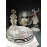 A selection of ceramics and figurines, including collectors plates