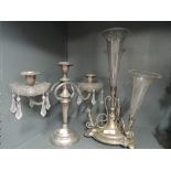 A Victorian epergne AF and similar three stem plated candle stick