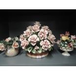 A large life like ceramic flower bowl hand decorated and two smaller similar