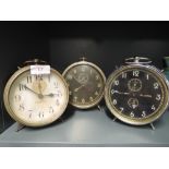 Three large size alarm clocks by Coral, Veglia and Mauthe