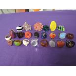 A tray of costume jewellery rings including perspex and ceramic