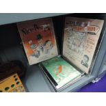 A selection of framed musical scores and prints