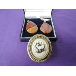 An orange banded agate drop brooch and pendant, and a pinchbeck reversible locket brooch
