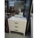 A vintage painted three drawer dressing table