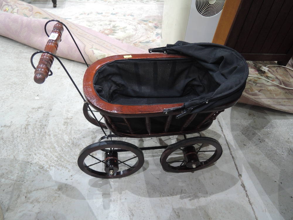 A reproduction dolls pram