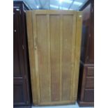 An early 20th Century oak wardrobe