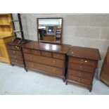 A stag dressing table and two bedside drawers