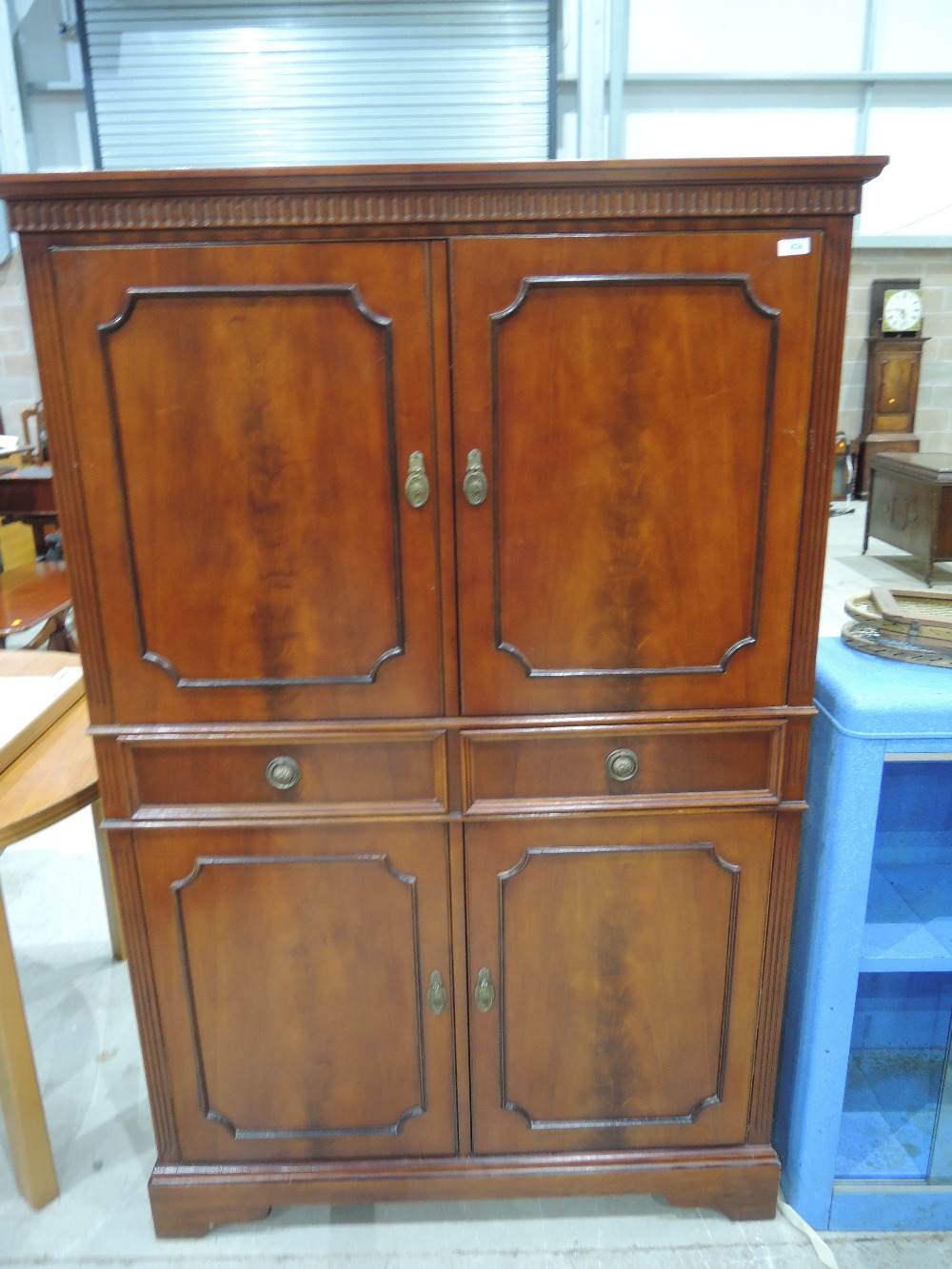 A reproduction mahogany cocktail cabinet