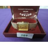 A gents gold plated Rotary wrist watch having baton numerals to rectangular face on woven strap