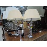A pair of modern table lamps having bubble glass bases