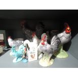 A selection of chicken hen and cock ceramic figures