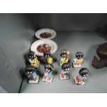 A selection of Robertson Jam advertising figures and trinket dishes