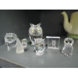 A selection of crystal glass figures of owls and similar