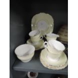 A part tea service by Colclough fine bone Chine with two tone yellow and white glaze