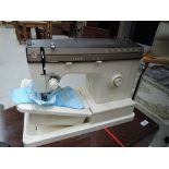 A vintage electric sewing machine by Singer