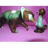 Two animal figures with green glaze including bear