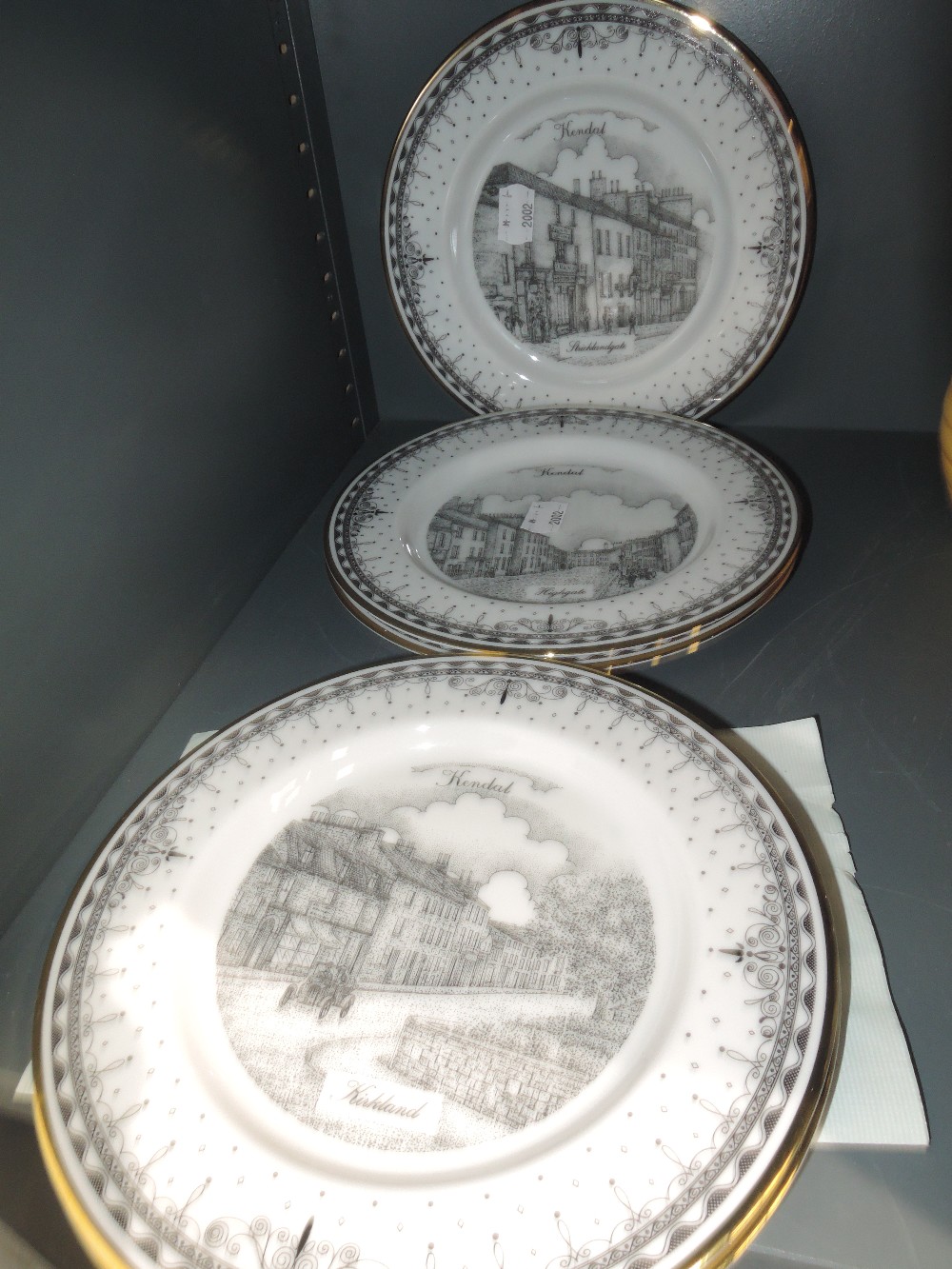 A selection of cabinet display plates by Decor Art depicting local Kendal scenes limited to only 200